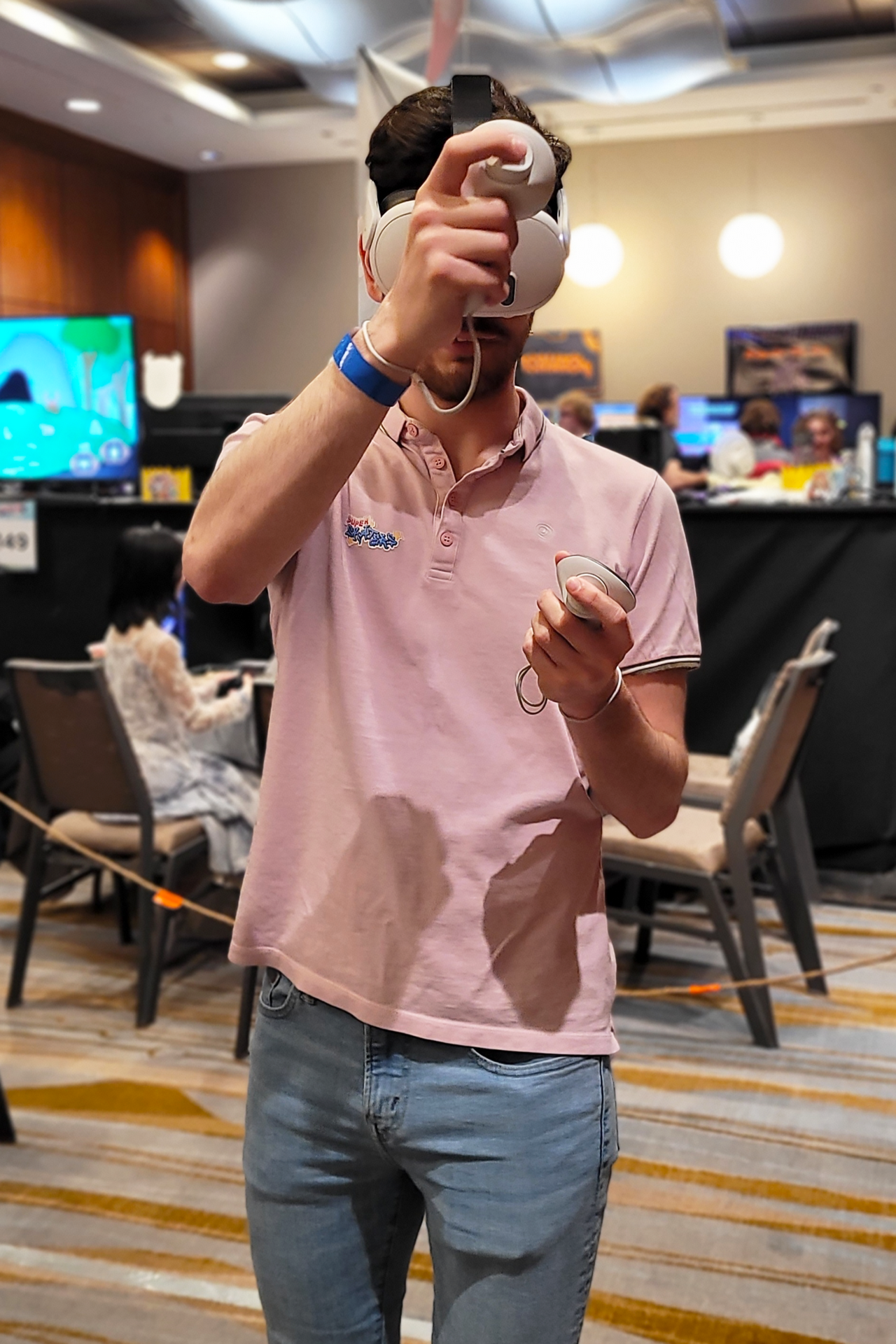Person intently focusing on placing an object in VR